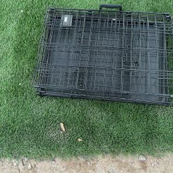 New Small Dog Cage 24 Inches Long By 20 Inches High And 17 Inches Wide Has Two