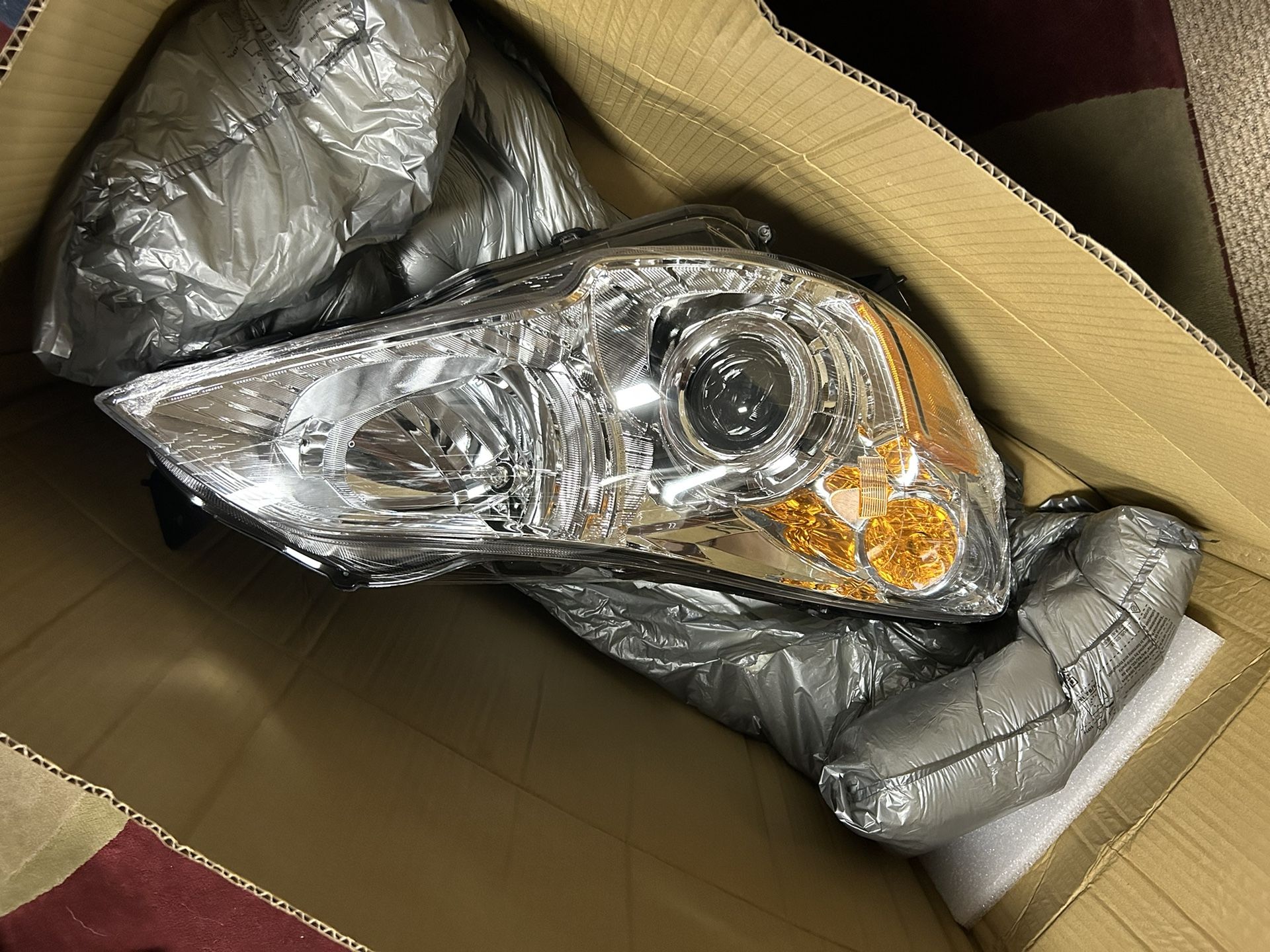 2010 Subaru, passenger headlight