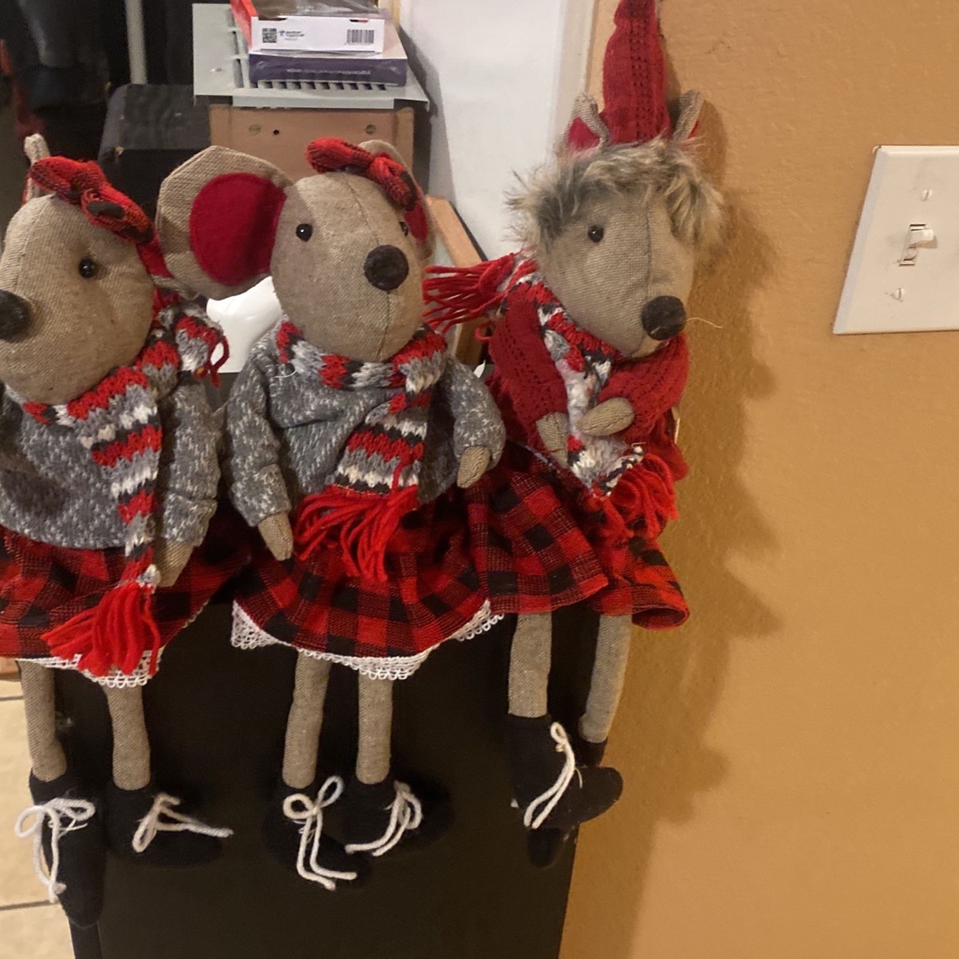 Three adorable mice with weighted bottoms can go on any shelf