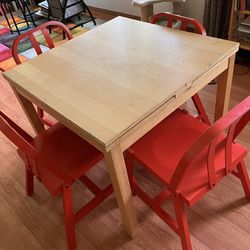 Wooden Table with 4 Red Chairs 