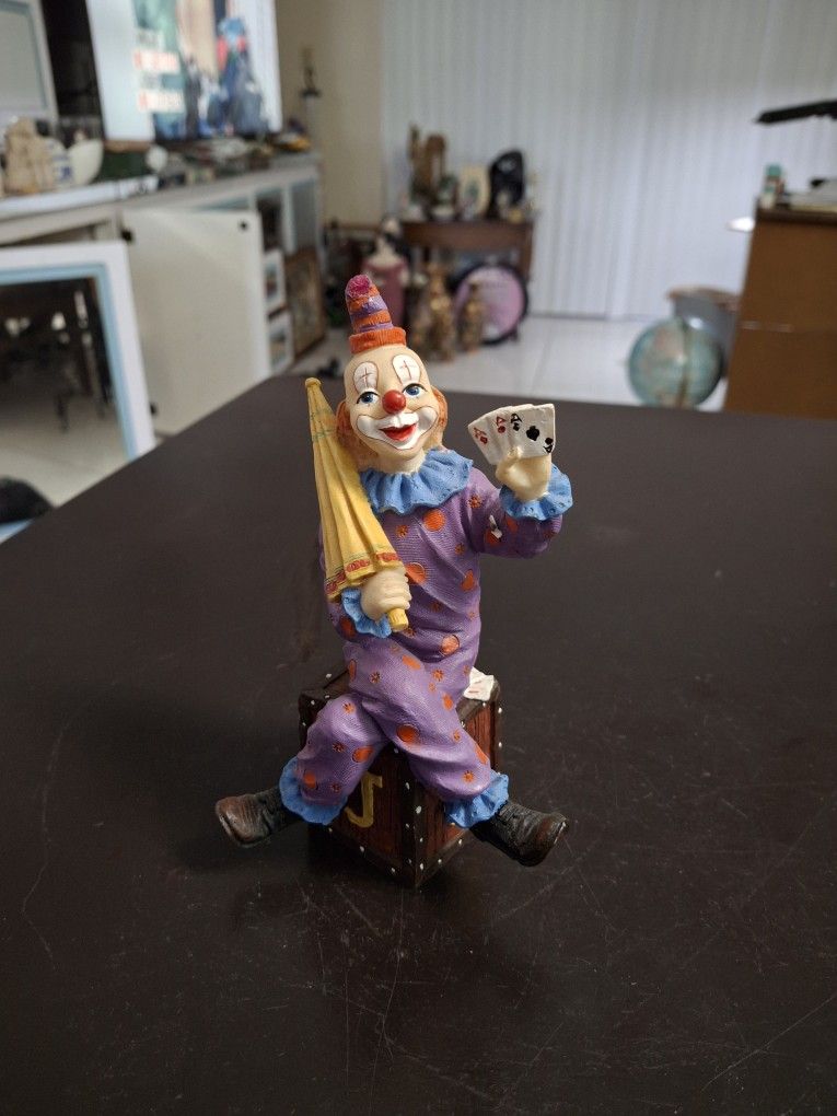 Vintage Clown Figurine Smiling Holding An Umbrella And 3 Aces, Sitting On An Alphabet Box 6.25"H