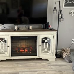 Realyn 74" TV Stand with Electric Fireplace