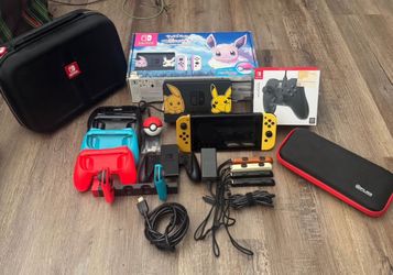Limited Edition Pikachu and Eevee Nintendo Switch Bundle With Games Etc.