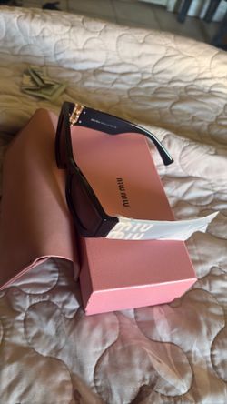 Women designer glasses miu miu