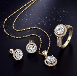 New 18 k yellow gold necklace, earrings and ring