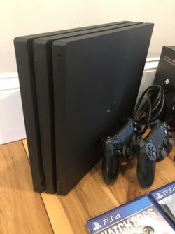 SALE] Sony PS4 Pro 1TB + 2x controllers and charger + 4 games