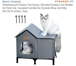 New in box Crispedia weatherproof outdoor cat house insulated bed house measures 20x13x16