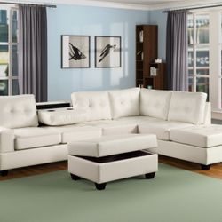 New White Leather Reversible Sectional And Ottoman