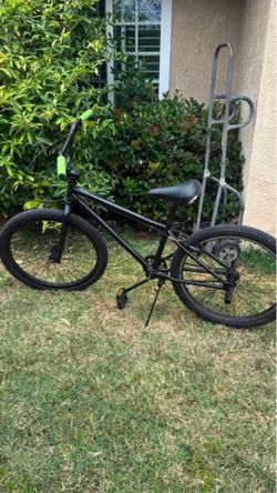 BMX style bicycle  (custom handle bars and seat