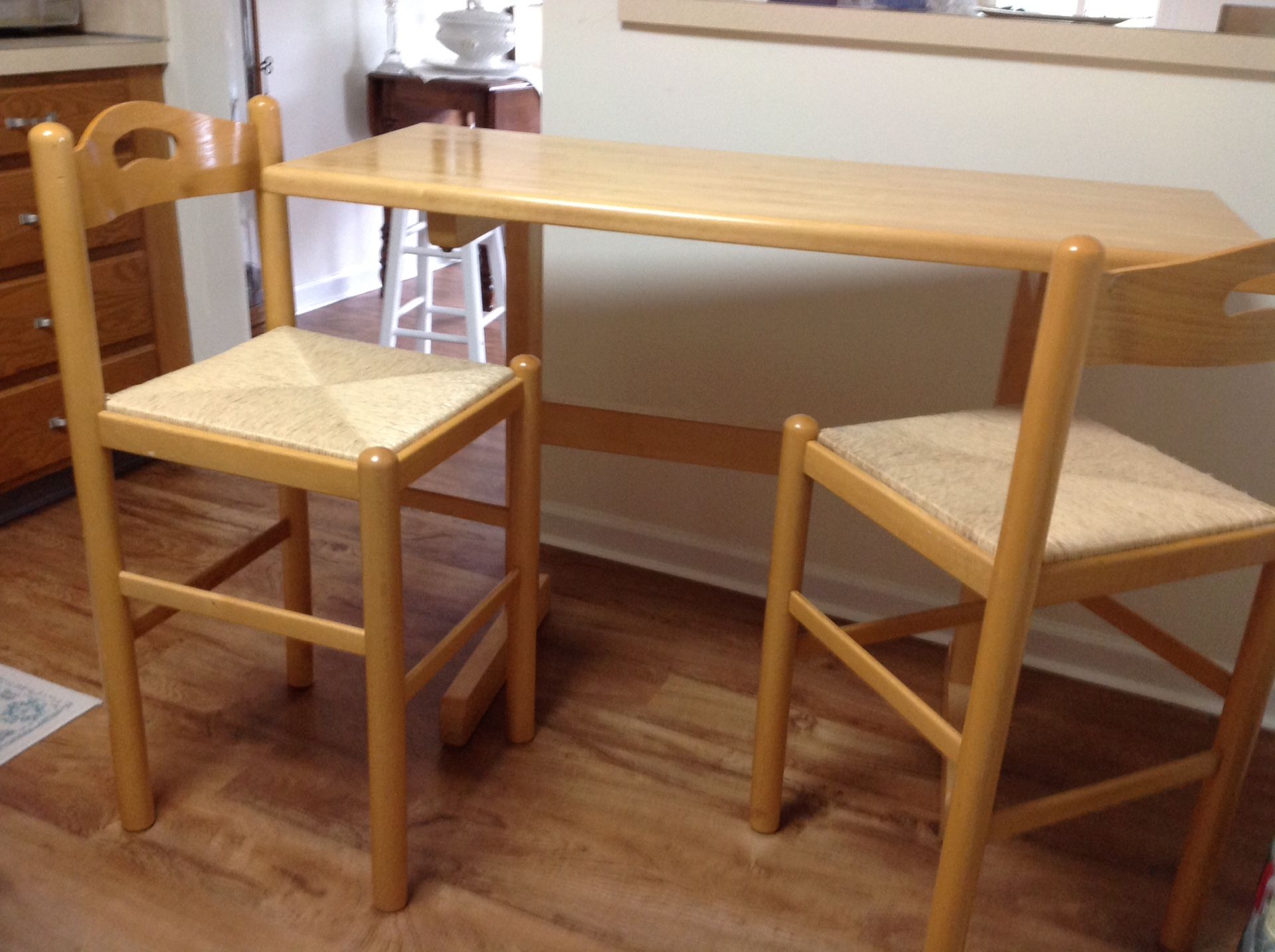 Eastern Butcher Block bar table with two stools.