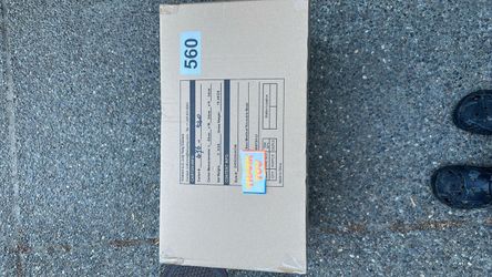 Sealed box of reusable face masks