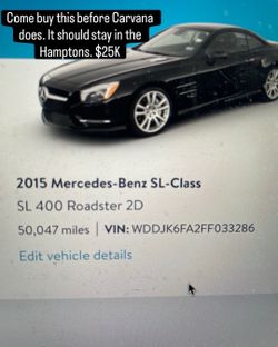 Mercedes 400sl black with bengal red leather