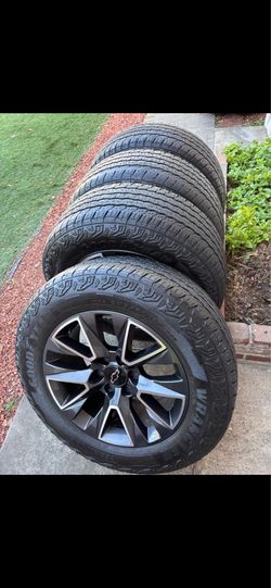 Chevy Silverado stock rims 20 and good tires