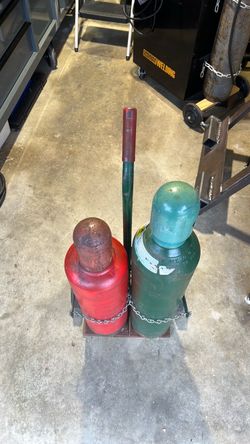 Oxygen acetylene tanks and welding cart