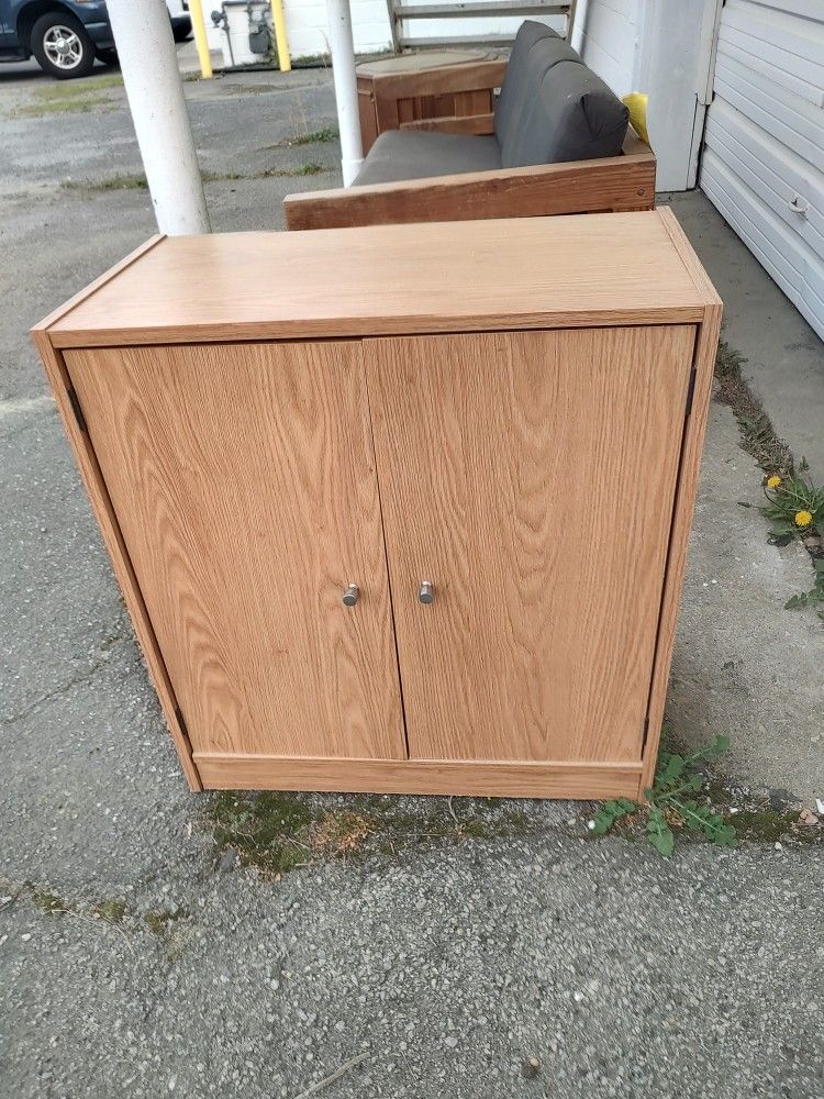 Small Cabinet with Shelf inside. 