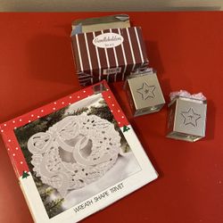 Holiday wreath shape trivet and two candle holders 