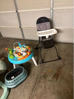 Baby items an a cat cage carrier