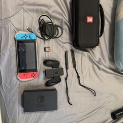 Nintendo Switch Comes With Everything In Picture. 