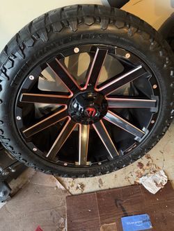 Fuel contra rims with venom power terra hunter all terrain tires 33x12.50r22lt.