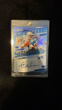 33/35 Signed André Ware Card