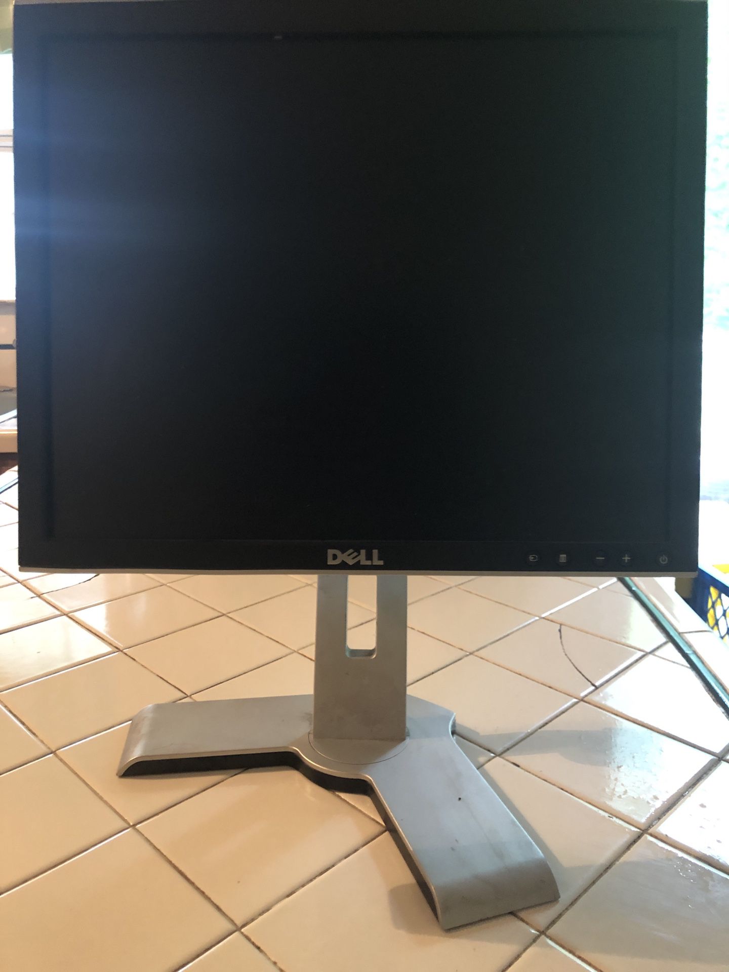 Two 17” Dell computer monitors