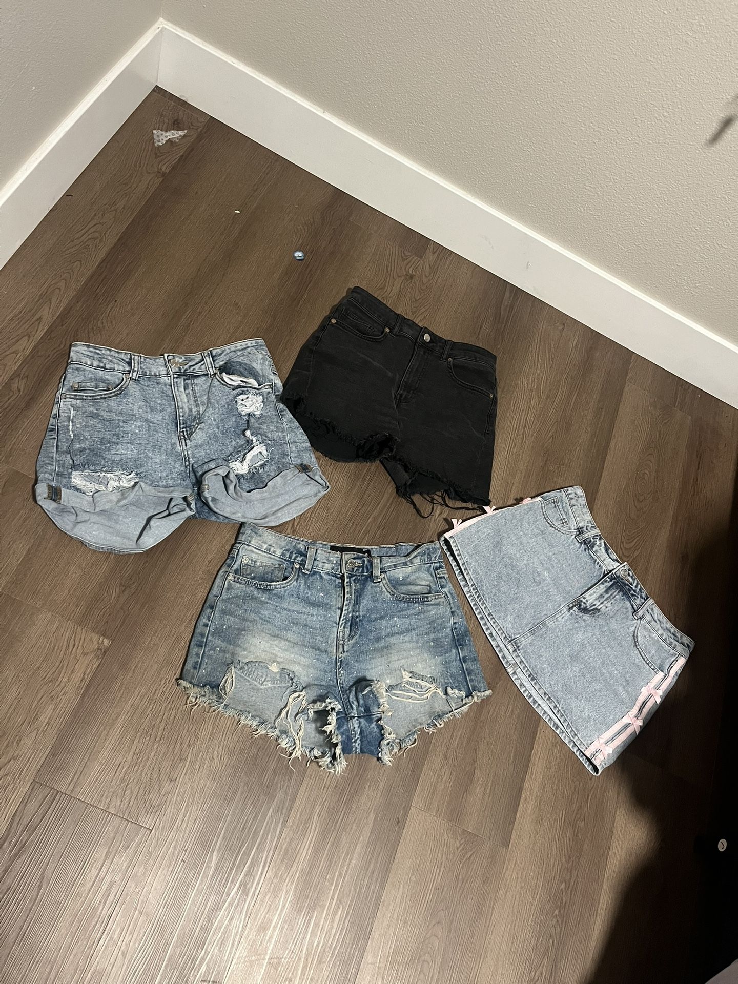 bundle of 3 pairs of shorts with one mini skirt