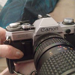Canon AE-1 Camera With Case And Lens