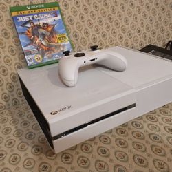 Xbox One with a Controller and a game