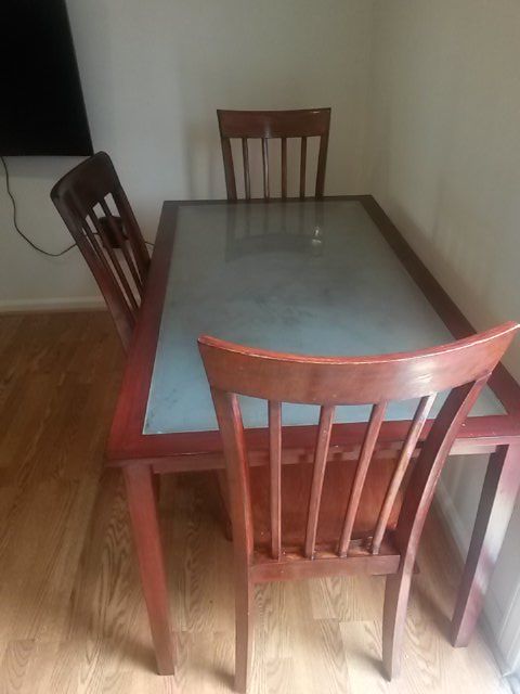 Dinner table with three chairs for 85.00 only.