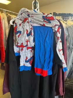 Spiderman thermal pjs w/2 pj pants one Spiderman one vibrant blue and red .