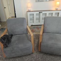 Two grey armchairs