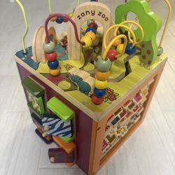 B. Toys Wooden Activity Cube  - Zany Zoo