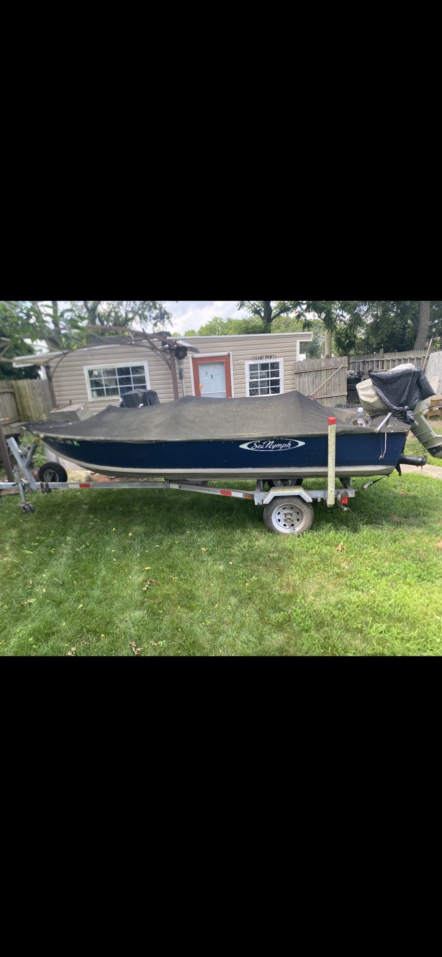 1985 14ft Aluminum Sea Nymph Boat. Motor & Trailer