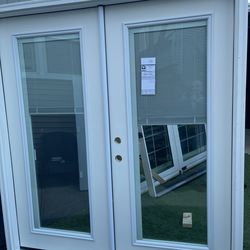 New patio door fiberglass French with blinds size w71.1/2 h79.1/2 $875