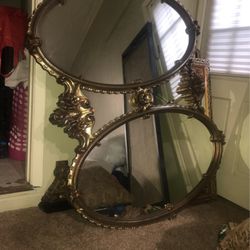 double mirrorin gold trim $100 a slight crack on bottom small glass piece area but can be replaced