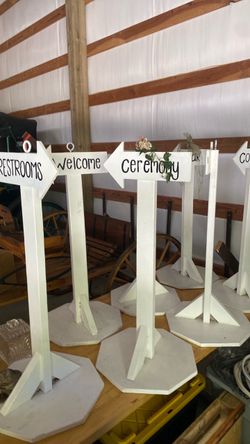 Directional signs, solid wood ($200)
