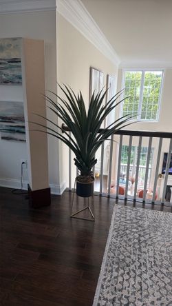 Large Agave faux plant in modern planter.