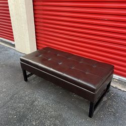 faux or bonded leather tufted storage ottoman bench.