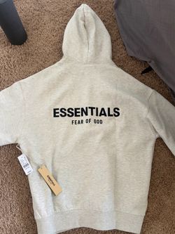 Light grey essentials hoodie with tag