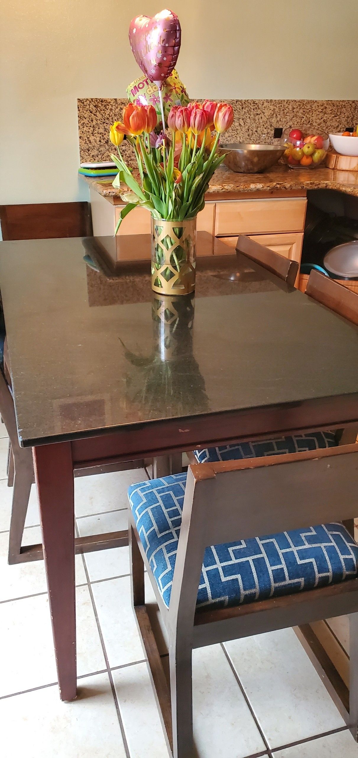 Granite kitchen table with 8 chairs