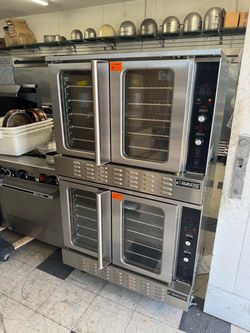 Brand new Dukers double stack full size convection ovens