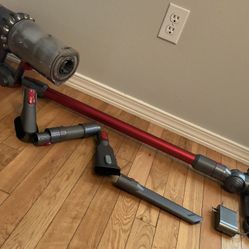 Dyson vacuum with all attachments and charger