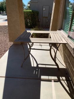 Table with strong iron frame