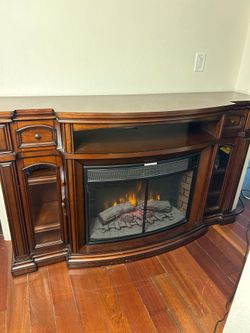 🪵 Curved Dark Wood Electric Fireplace TV Console – Multi-Color Flame (Must Go ASAP!)