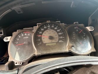 Parting out 2006 Toyota Tacoma speedometer and steering column assy
