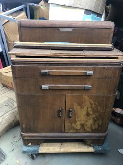 Antique circa 1930s cabinet with drawers.