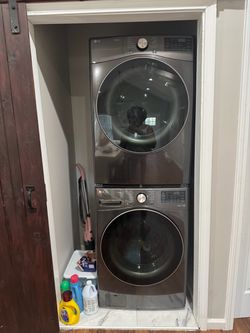 LG 4.5 Cu. Ft. Stackable SMART Front Load Washer & Dryer in Black Steel