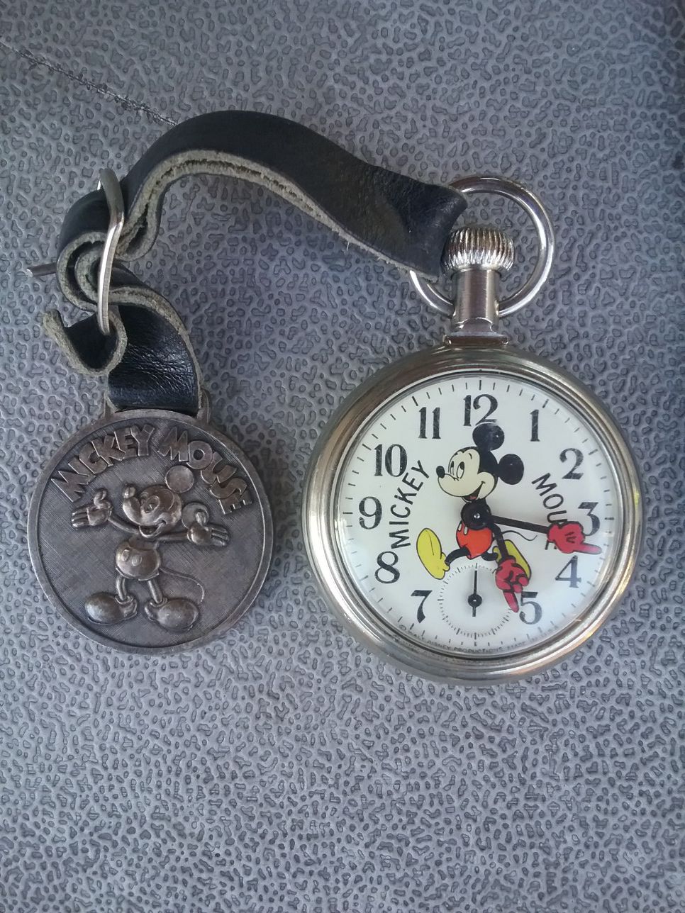Mickey Mouse pocket watch, Coca-Cola, and Kareem Abdul Jabar