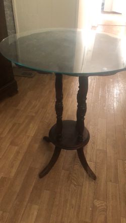 Antique table with glass top