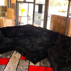 Black pull out sectional sofa with cuddler corduroy fabric